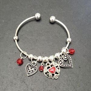 **Final Sale** Silver tone charm bangle bracelet